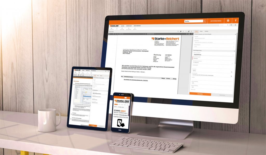 Mobile Geräte am Arbeitsplatz mit Starke-DMS Unterlagen am Bildschirm