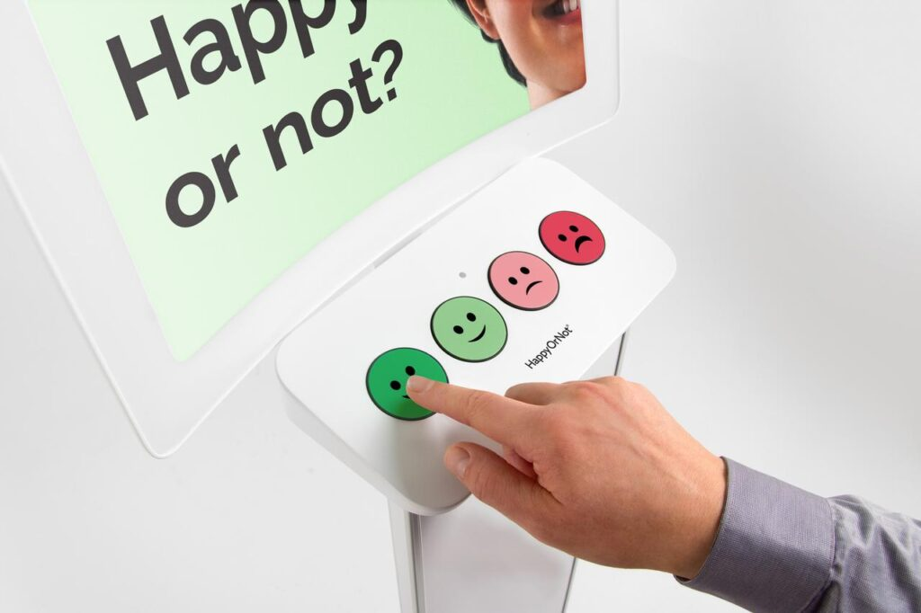 Mood Meter mit Tasten und Umfrage für das Monitoren der Eindrücke von Nutzern.
